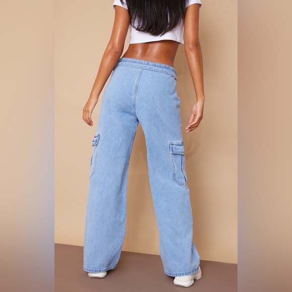 PRETTY LITTLE THING LIGHT BLUE WASH ASYMMETRIC FOLDOVER WAISTBAND JEANS size 10 - Picture 2 of 7